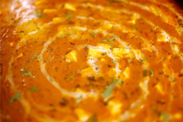 Rich Gravy Shahi Paneer Lababdar with Cream Garnish