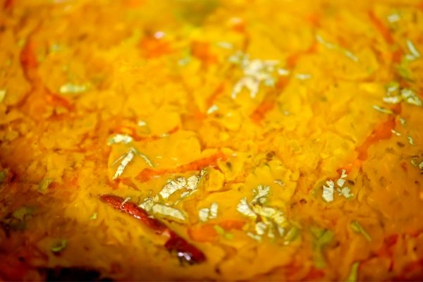 Yellow Dal Tadka Garnished with Coriander and Spices